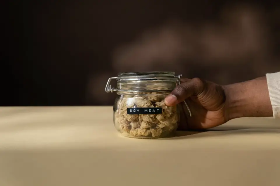 Calming soft chews next to a bag with a visible ingredient panel