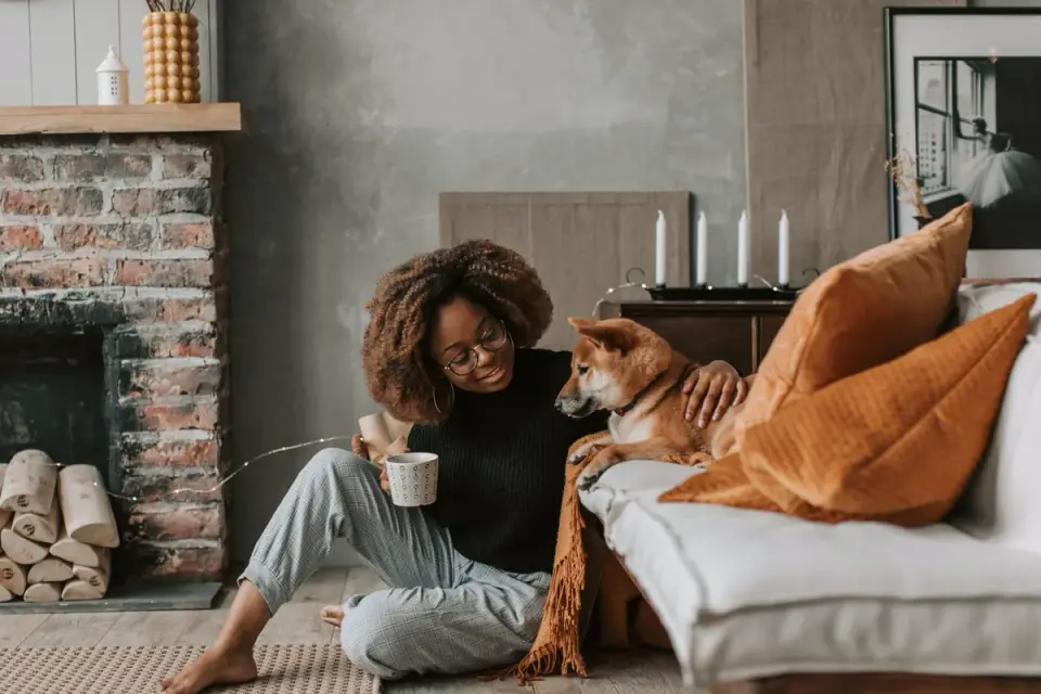 Dog owner at home